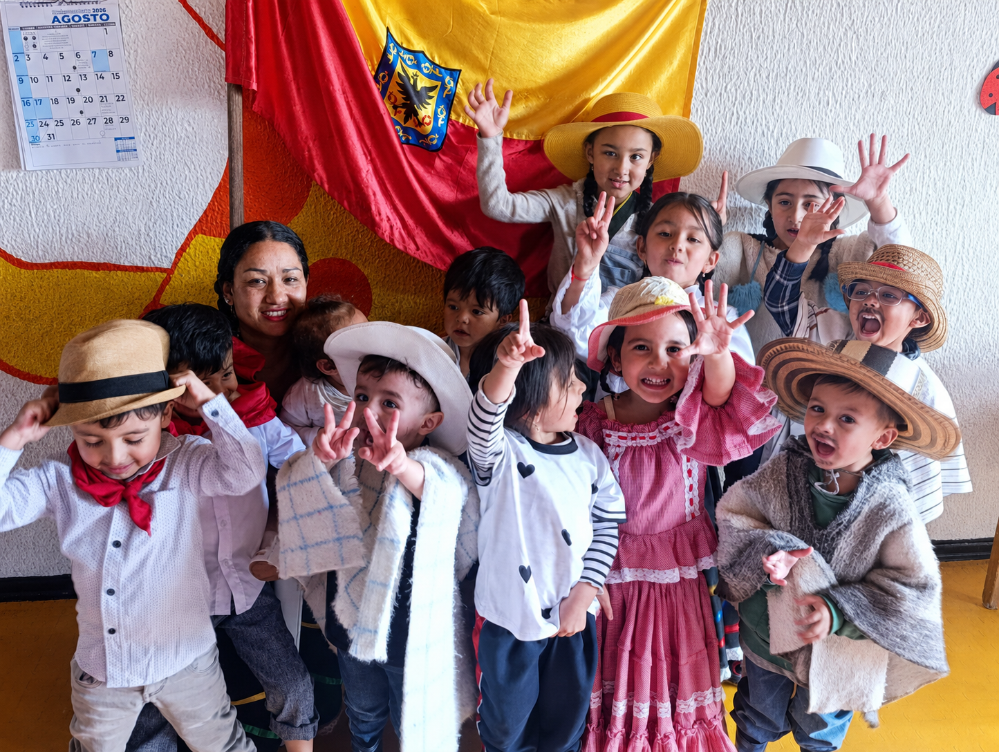 Children in traditional Colombian dress celebrating together